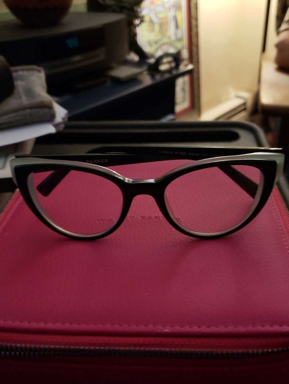 Warby Parker Black and Gold Cat-Eye Glasses with Pink Lenses